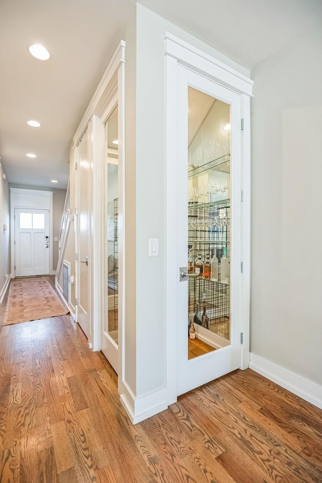 doorway with light hardwood / wood-style flooring