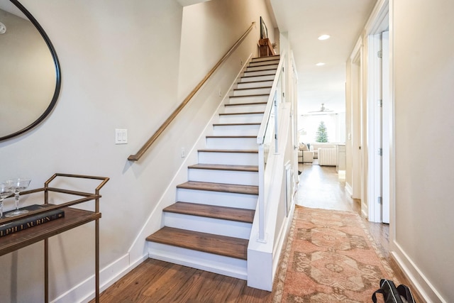 stairway with wood-type flooring