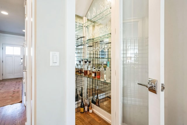 wine room featuring wood-type flooring