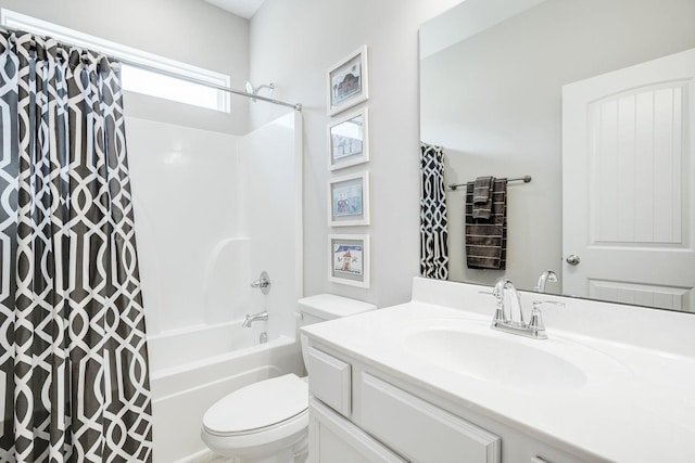 full bathroom featuring toilet, shower / bath combo, and vanity