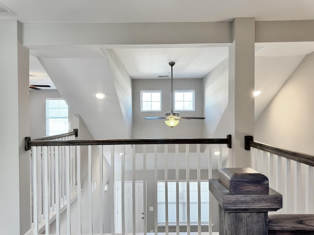 staircase with ceiling fan