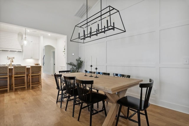 dining space featuring light hardwood / wood-style floors