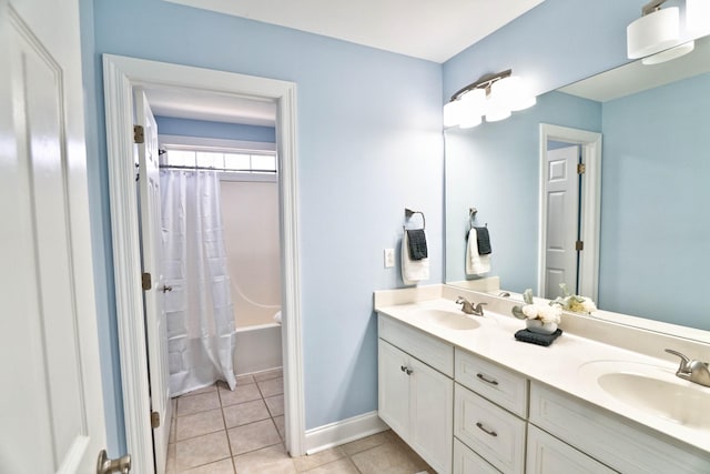 bathroom with tile patterned flooring, vanity, and shower / tub combo with curtain