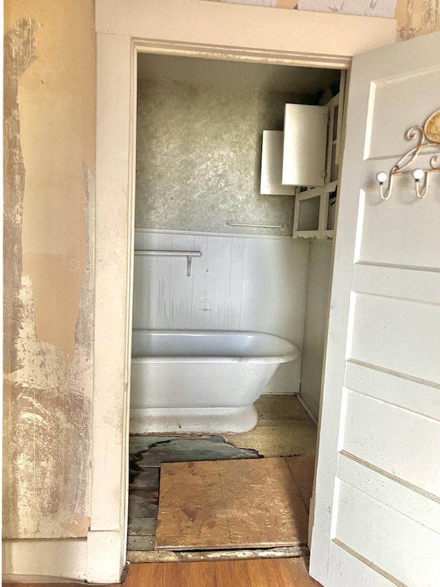 bathroom with hardwood / wood-style floors