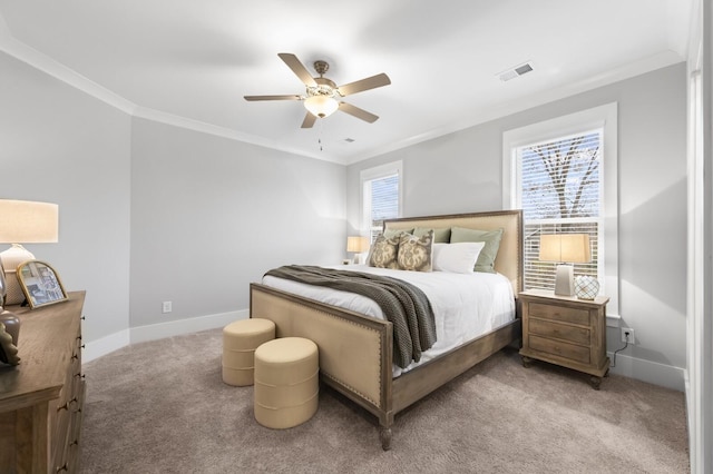 carpeted bedroom featuring ceiling fan and ornamental molding