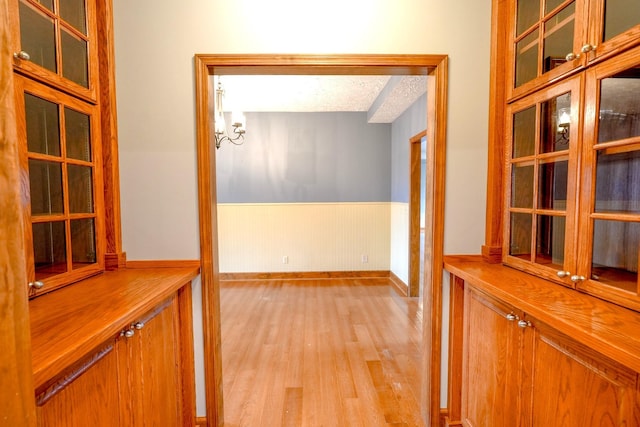 hallway with light wood-type flooring