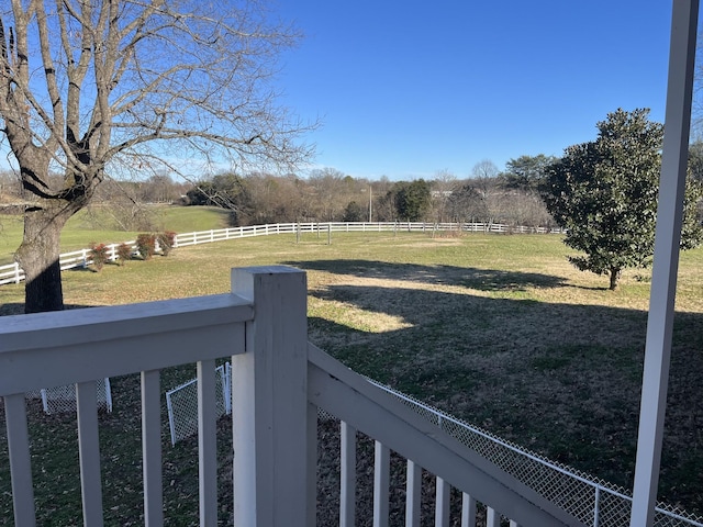 view of yard with a rural view