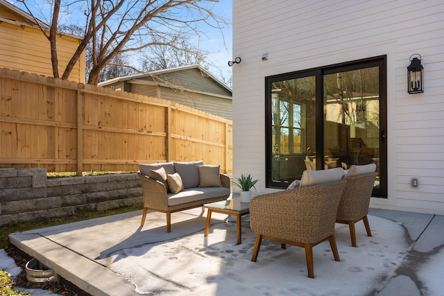 view of patio / terrace with fence and outdoor lounge area