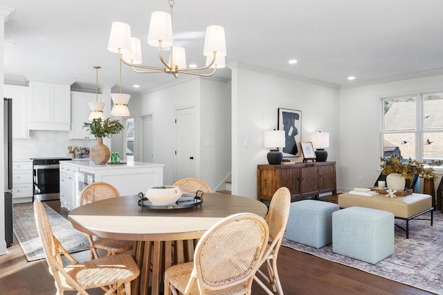 dining space with dark hardwood / wood-style flooring, ornamental molding, and a chandelier