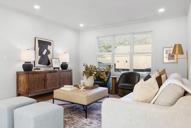 living room with recessed lighting, crown molding, baseboards, and wood finished floors