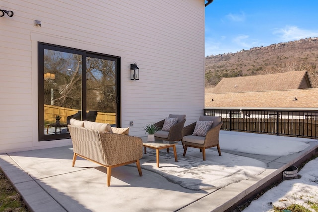 view of patio / terrace with a mountain view