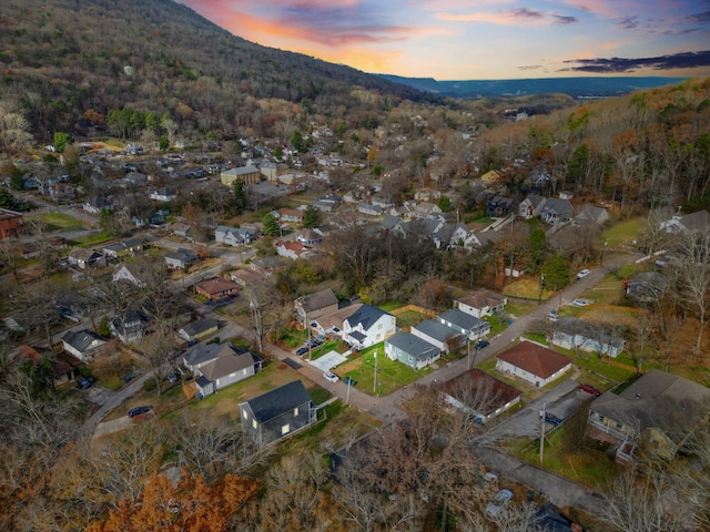 aerial view at dusk with a mountain view