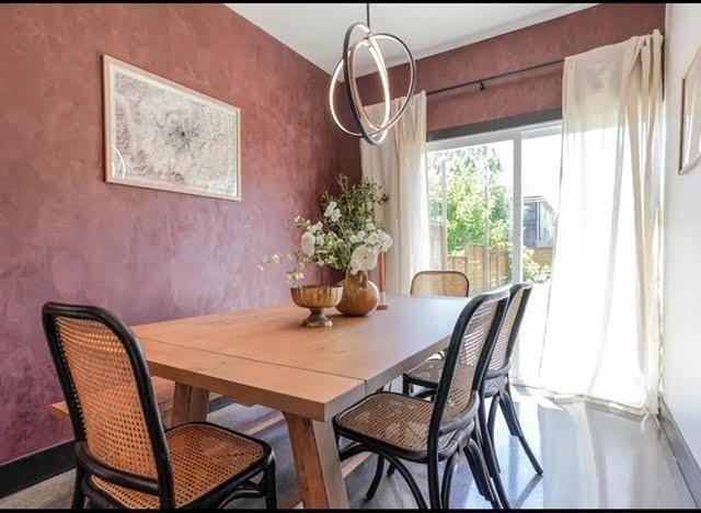 dining room featuring a chandelier