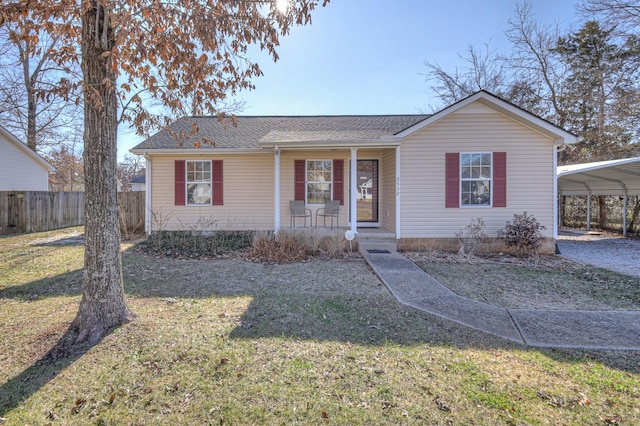 single story home with a front lawn, a carport, and covered porch