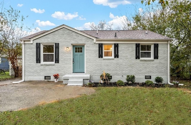 view of front of home with a front yard