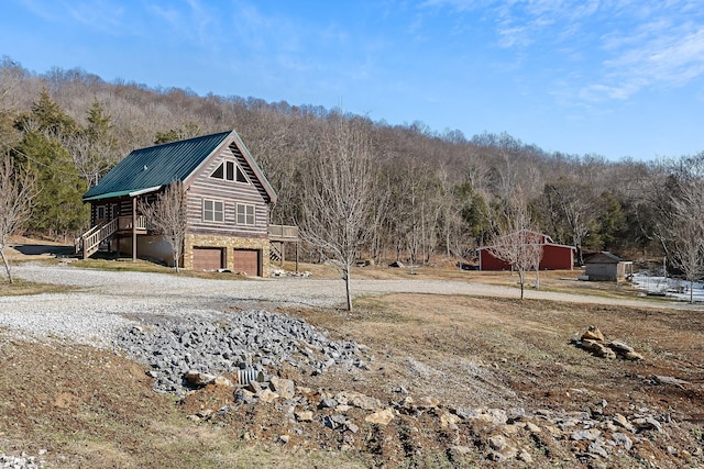 view of yard with a garage