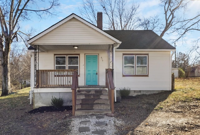 bungalow-style home with a porch