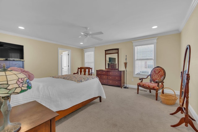 bedroom with ceiling fan, crown molding, and light colored carpet