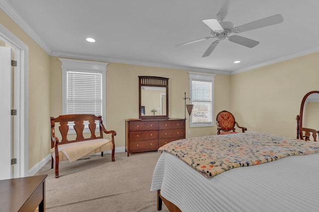 bedroom featuring ceiling fan, light colored carpet, and ornamental molding