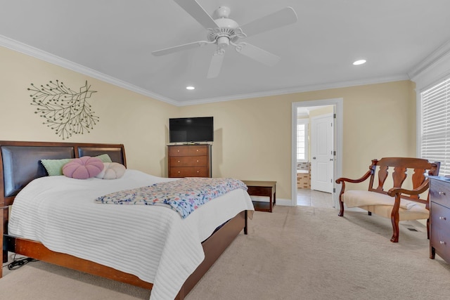 bedroom featuring light carpet, ceiling fan, ornamental molding, and ensuite bathroom