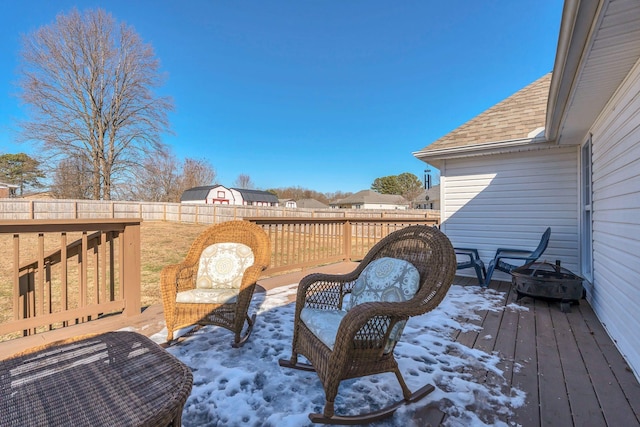 view of snow covered deck