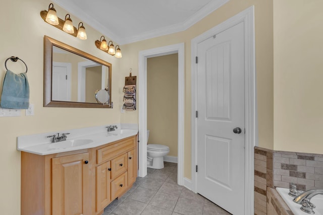 bathroom featuring toilet, tiled bath, vanity, tile patterned floors, and ornamental molding