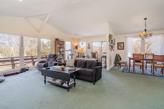 living room featuring a notable chandelier, vaulted ceiling, and carpet flooring