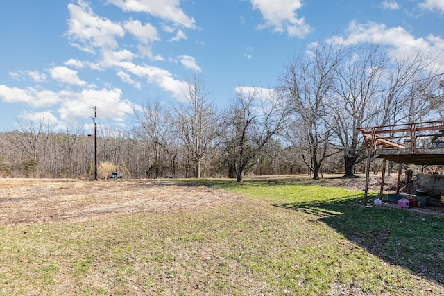 view of yard featuring a deck