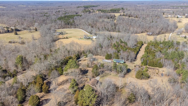 bird's eye view featuring a forest view