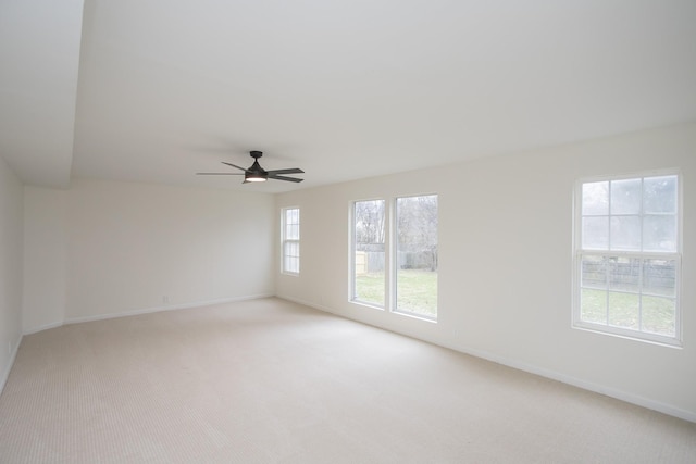 carpeted empty room with ceiling fan