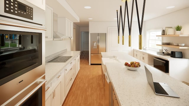 kitchen featuring stainless steel fridge with ice dispenser, white cabinetry, light stone counters, and decorative light fixtures