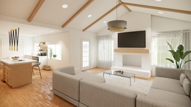 living room featuring light hardwood / wood-style flooring and lofted ceiling with beams