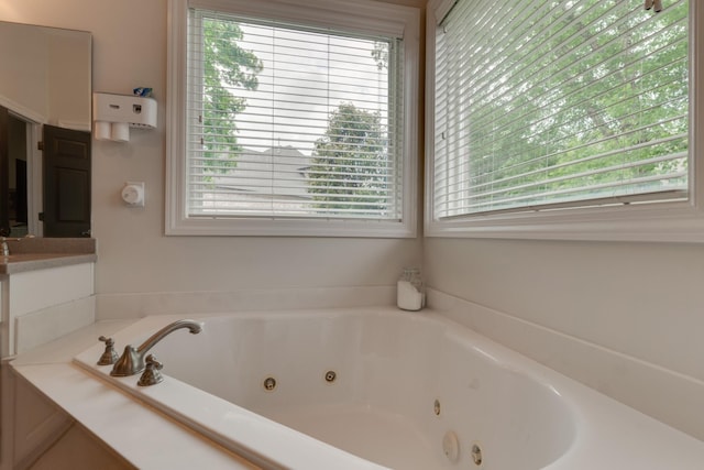 bathroom featuring a bath