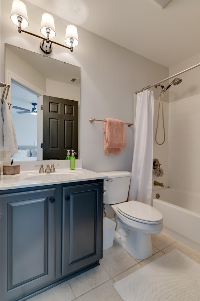 full bathroom with ceiling fan, vanity, toilet, tile patterned floors, and shower / bathtub combination with curtain