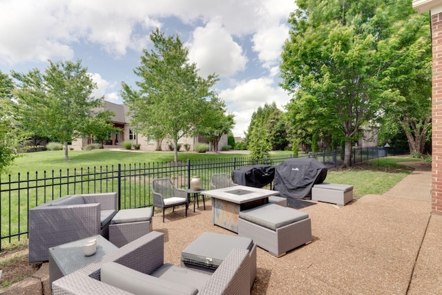 view of patio featuring a fire pit and area for grilling