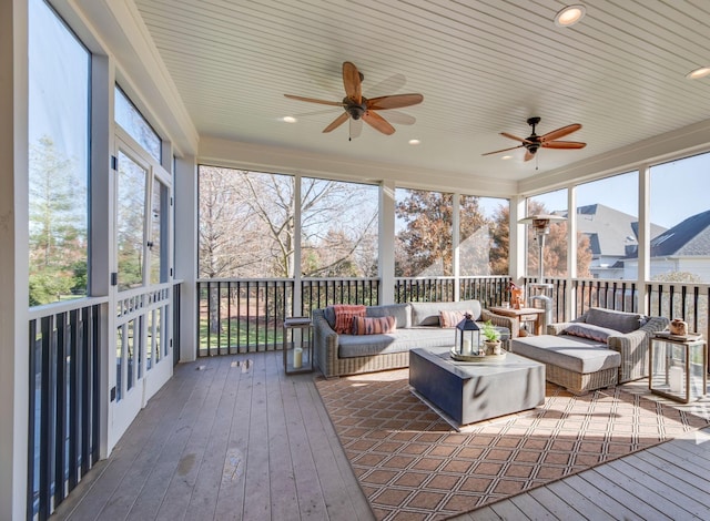 sunroom / solarium with ceiling fan and plenty of natural light