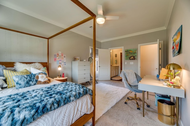 carpeted bedroom featuring ceiling fan, ornamental molding, and connected bathroom