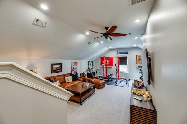 carpeted living room with lofted ceiling and ceiling fan