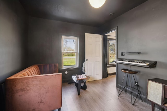 sitting room with light hardwood / wood-style floors