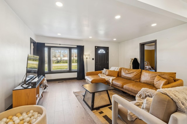 living room featuring light wood-type flooring