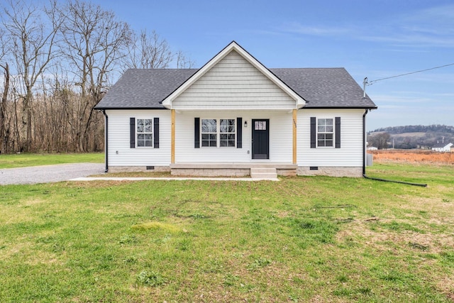 view of front of property featuring a front lawn and covered porch