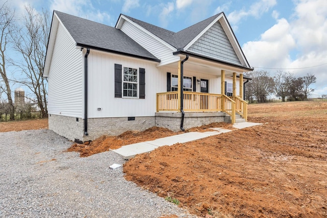 view of front of property featuring covered porch