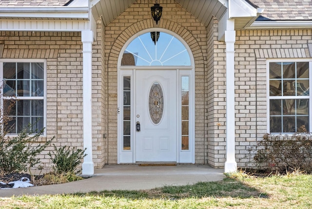 entrance to property with a porch