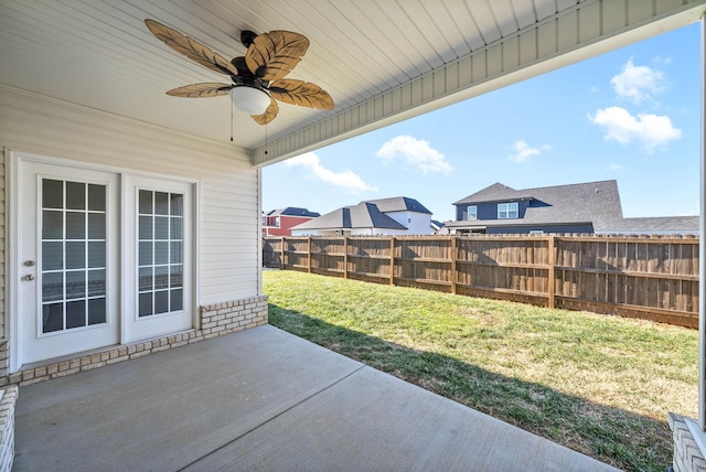 view of patio featuring ceiling fan