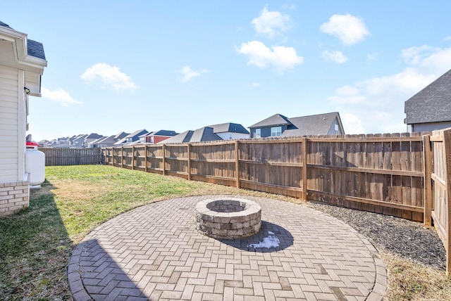 view of patio / terrace featuring an outdoor fire pit