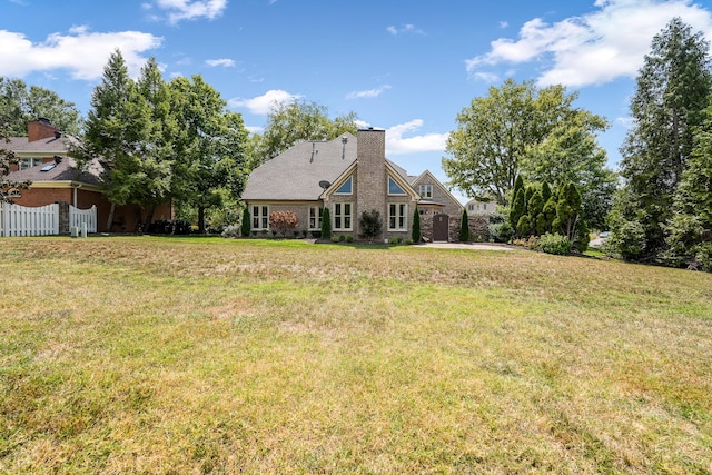 exterior space with a front yard