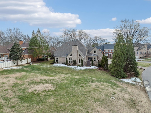 exterior space featuring a front lawn