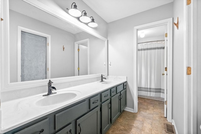 bathroom featuring vanity