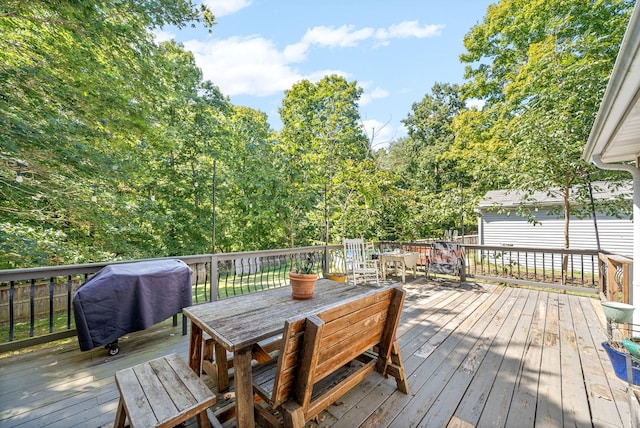 wooden deck featuring grilling area