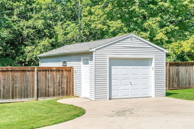 garage with a yard